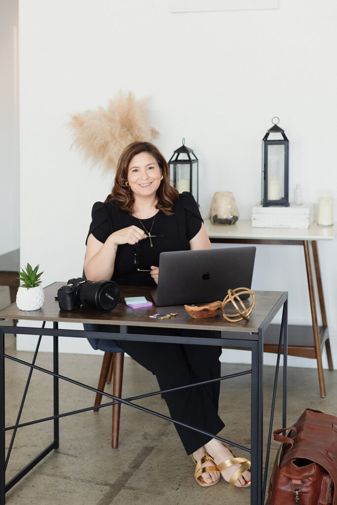 woman sitting at desk and working Chicago branding mini sessions