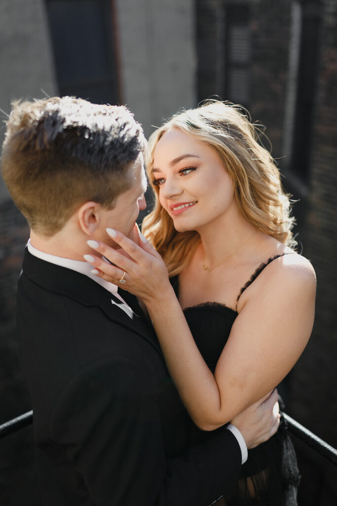 couple gazing into each others eyes Romantic River North engagement session