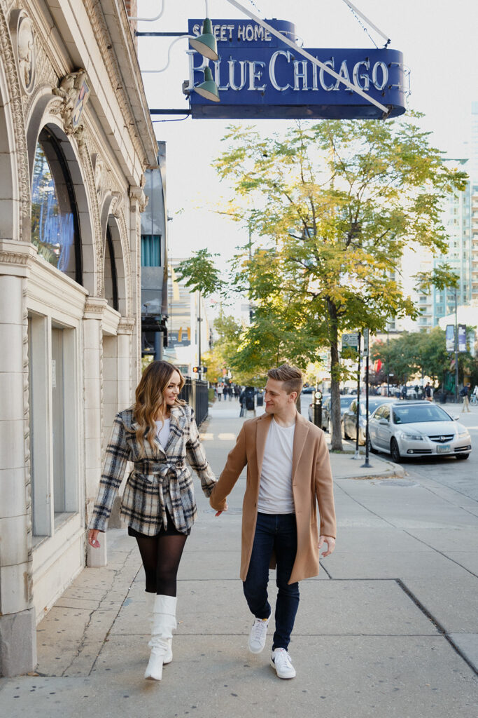 couple walking from their apartment Romantic River North engagement session