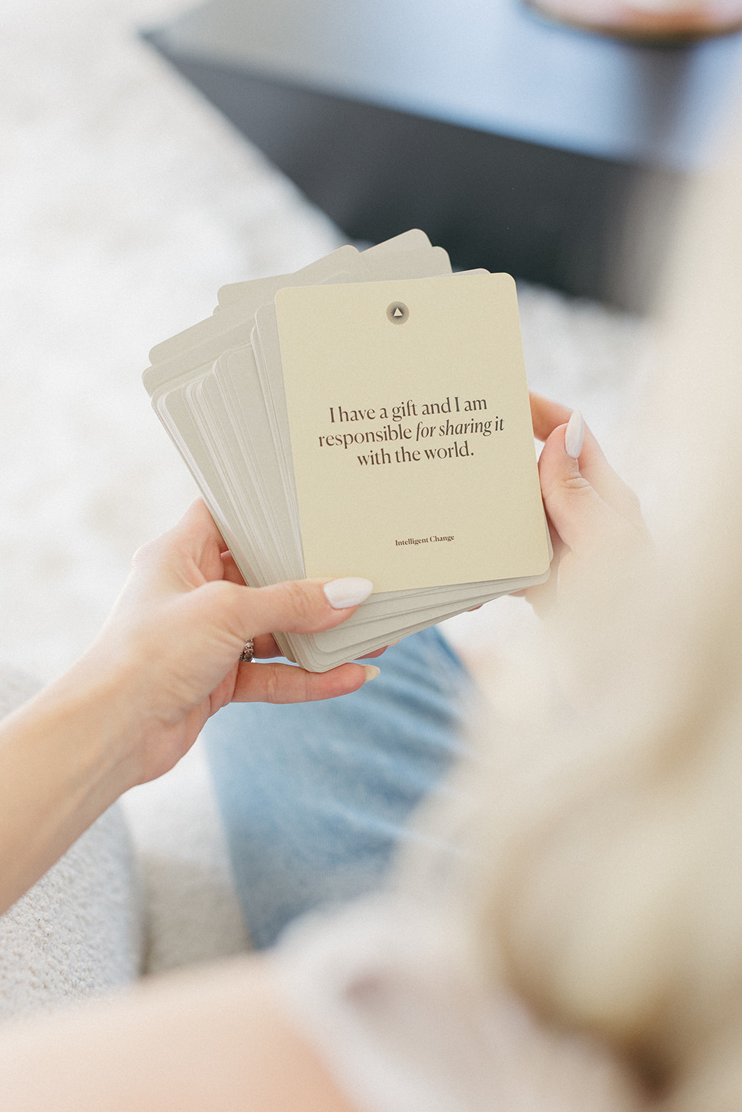 woman looking at inspirational motivation cards brand photo