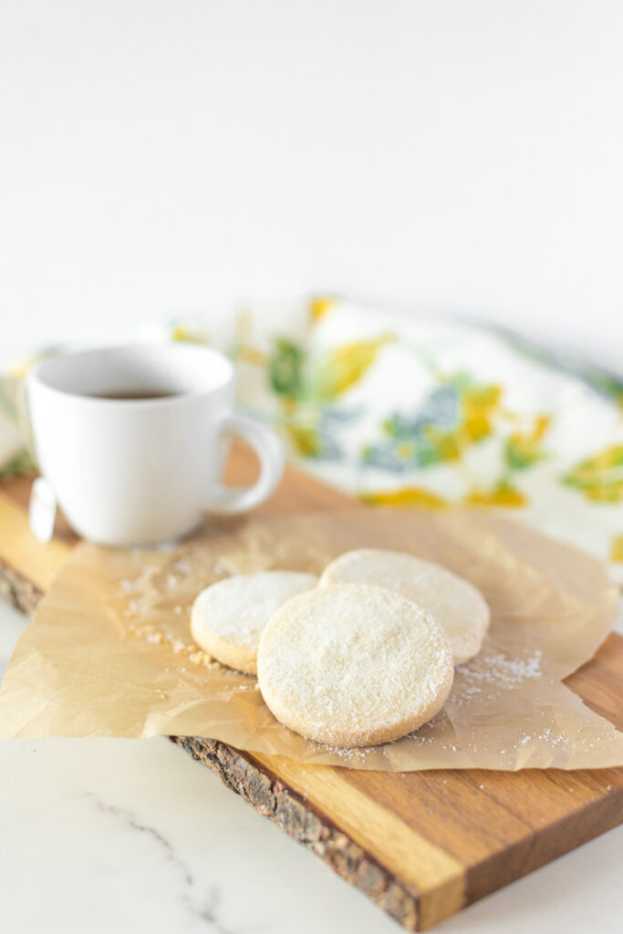 product photography setup with cookies, tea, and spring florals