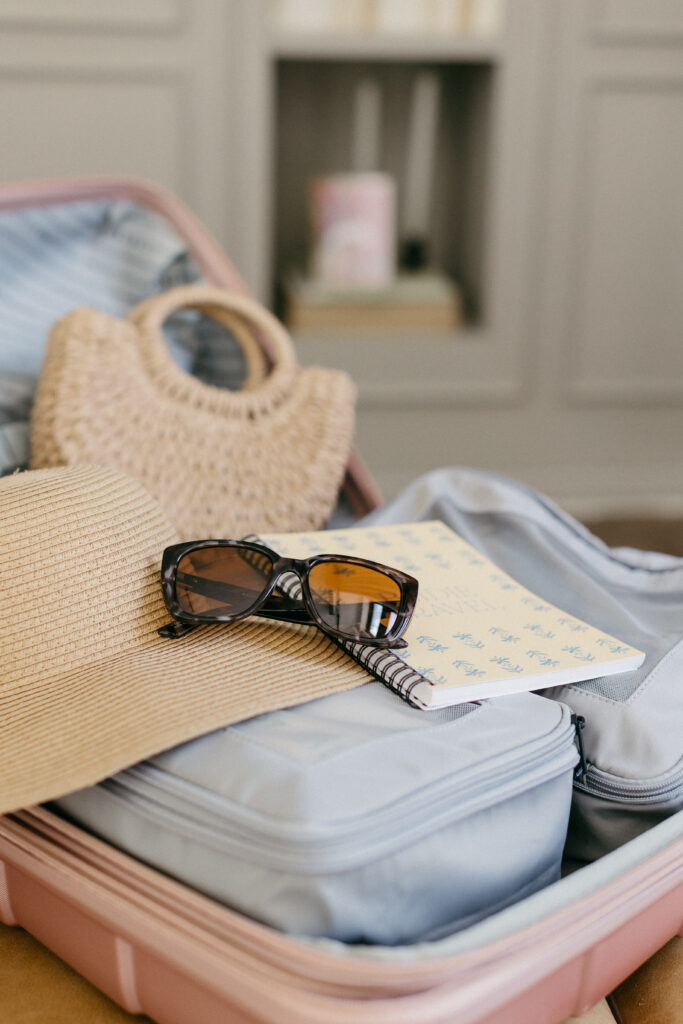 Luxury wedding travel planner details suitcase