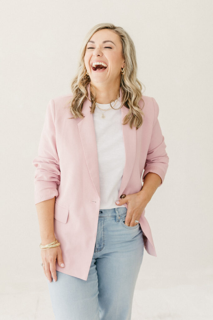 Megan of Bridie Travel laughing headshots for luxury destination wedding travel planner