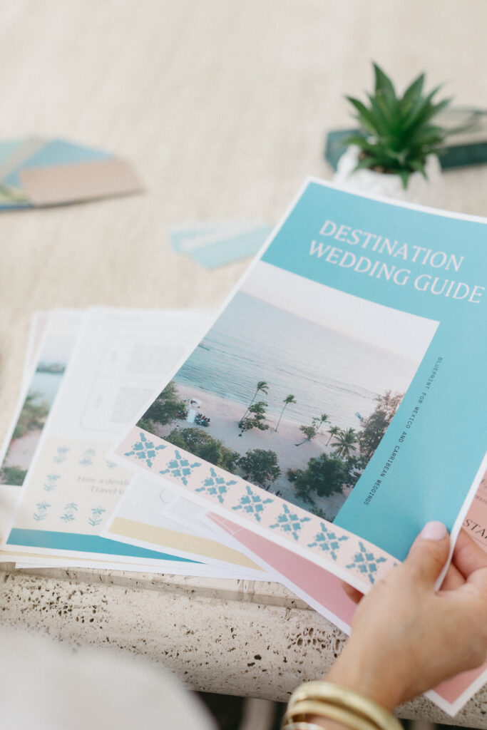 Luxury travel planner Megan working at her desk during brand photography session with Lisa Kathan