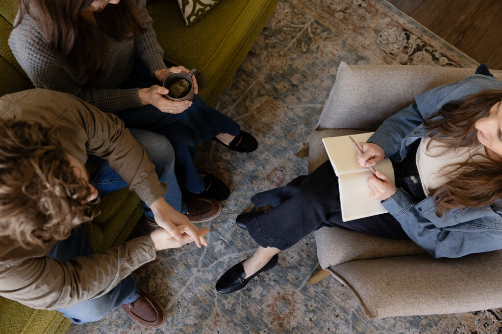 Brand photos for therapists showing a couples during a client session photographed from overhead