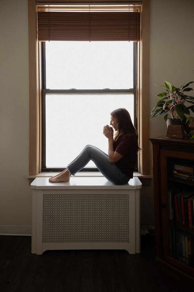 Moody therapy practice brand photos with a tea in a windowsill