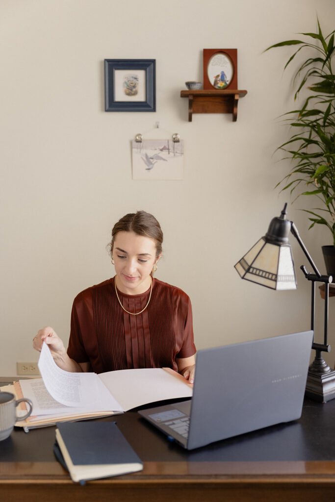Brand photography for a Chicago therapist working on a laptop